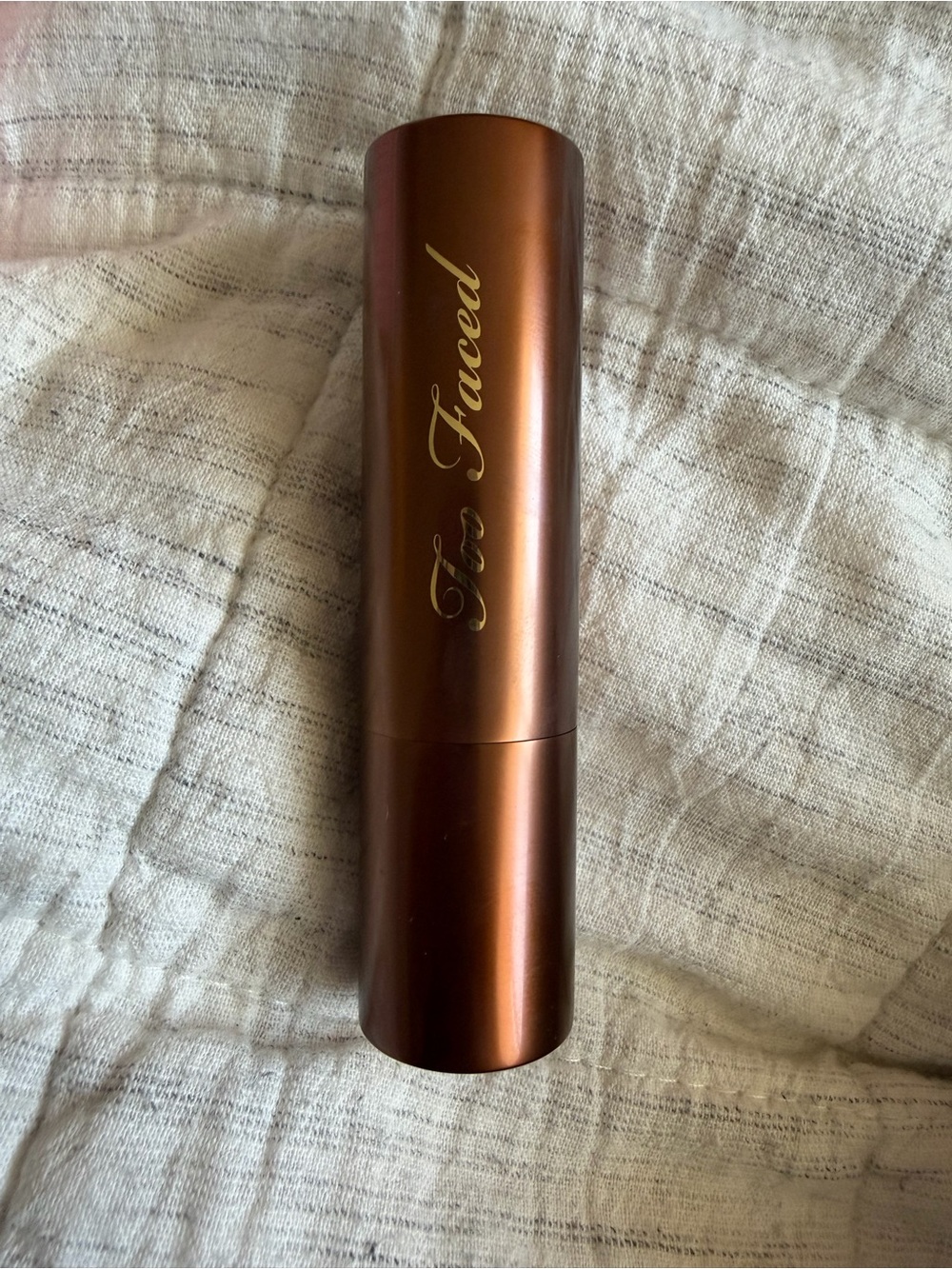 Too Faced melting, and bronzing sculpting stick swatched once